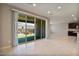 Bright dining area with sliding glass doors leading to the backyard at 9925 E Orange Grove St, Florence, AZ 85132