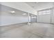 Large garage with high ceilings and extra storage space at 9925 E Orange Grove St, Florence, AZ 85132