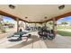 Relaxing community pavilion with picnic tables and grills at 11111 E Elmhurst Dr, Sun Lakes, AZ 85248