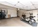 Spacious two-car garage with golf cart and extra storage at 11111 E Elmhurst Dr, Sun Lakes, AZ 85248