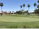 Landscaped golf course with putting green at 11111 E Elmhurst Dr, Sun Lakes, AZ 85248