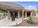 Covered patio with seating area and fire pit at 11111 E Elmhurst Dr, Sun Lakes, AZ 85248