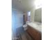 Updated bathroom with shower, toilet, and vanity at 11275 N 99Th Ave # 7, Peoria, AZ 85345