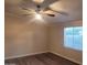 Bedroom with ceiling fan and large window at 11275 N 99Th Ave # 7, Peoria, AZ 85345