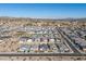 Aerial view of a large neighborhood in a desert climate at 1130 W Avalon Canyon Dr, Casa Grande, AZ 85122