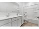 Clean bathroom, featuring a double vanity and bathtub at 1130 W Avalon Canyon Dr, Casa Grande, AZ 85122