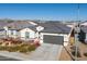 Single story home with gray roof and landscaping at 1130 W Avalon Canyon Dr, Casa Grande, AZ 85122