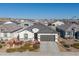 Single story home with gray roof and landscaping at 1130 W Avalon Canyon Dr, Casa Grande, AZ 85122