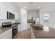 Modern kitchen with stainless steel appliances and granite countertops at 1130 W Avalon Canyon Dr, Casa Grande, AZ 85122