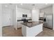 Spacious kitchen with island, stainless steel appliances, and granite counters at 1130 W Avalon Canyon Dr, Casa Grande, AZ 85122