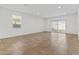 Bright and airy living room with tile floors and sliding glass doors at 1130 W Avalon Canyon Dr, Casa Grande, AZ 85122