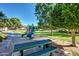 Community playground with a slide and picnic table at 1201 E Campbell Ave, Gilbert, AZ 85234