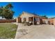 Backyard patio with seating area and shed at 12443 W Via Camille Dr, El Mirage, AZ 85335