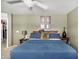 Comfortable main bedroom with a king-size bed at 12443 W Via Camille Dr, El Mirage, AZ 85335