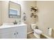 Modern bathroom with white vanity, tile floor, and stylish fixtures at 1255 N Arizona Ave # 1148, Chandler, AZ 85225