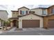 Two-story home with attached garage and welcoming entryway at 1255 N Arizona Ave # 1148, Chandler, AZ 85225