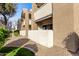 Condo building exterior with walkway and landscaping at 1295 N Ash St # 913, Gilbert, AZ 85233