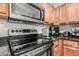 Kitchen with stainless steel appliances and granite counters at 1295 N Ash St # 913, Gilbert, AZ 85233