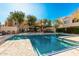 Inviting community swimming pool with lounge chairs at 1295 N Ash St # 913, Gilbert, AZ 85233