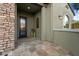 Elegant entryway with stone tile and decorative pots at 13213 W Duane Ln, Peoria, AZ 85383