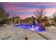 Inviting pool and spa with built in seating at sunset at 13213 W Duane Ln, Peoria, AZ 85383