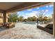 Inviting pool area with covered patio and comfortable lounge chairs at 13213 W Duane Ln, Peoria, AZ 85383