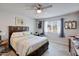 Bedroom with a queen-size bed and ceiling fan at 13609 N Newcastle Dr, Sun City, AZ 85351