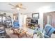 Living room with comfortable seating and a TV at 13609 N Newcastle Dr, Sun City, AZ 85351