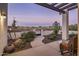 Relaxing patio with desert landscaping at 14235 E Dale Ln, Scottsdale, AZ 85262