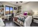 Bright bedroom with mountain views and a workspace at 14235 E Dale Ln, Scottsdale, AZ 85262