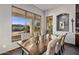 Bright dining room with large windows offering scenic views at 14235 E Dale Ln, Scottsdale, AZ 85262