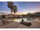 Inviting pool area with lounge chairs, offering a relaxing outdoor space at 14235 E Dale Ln, Scottsdale, AZ 85262