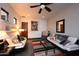 Relaxing sitting area with comfortable sofas and colorful rug at 14235 E Dale Ln, Scottsdale, AZ 85262