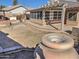 Large backyard space with covered patio and fountain at 14838 S 47Th Way, Phoenix, AZ 85044