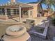 Backyard with covered patio, built-in BBQ, and storage shed at 14838 S 47Th Way, Phoenix, AZ 85044