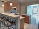 Open kitchen with an island and ample cabinet space at 14838 S 47Th Way, Phoenix, AZ 85044