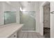 Clean bathroom with vanity, shower, and updated fixtures at 15158 W Camino Estrella Dr, Surprise, AZ 85374