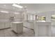 Kitchen boasts an island and ample counter space at 15158 W Camino Estrella Dr, Surprise, AZ 85374