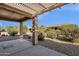 Covered patio with pergola and desert landscaping at 15158 W Camino Estrella Dr, Surprise, AZ 85374