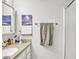 Bathroom featuring a vanity, mirror, and towel rack at 1732 E Baker Dr, Tempe, AZ 85282