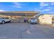 Covered parking area with two parking spots and storage unit at 1732 E Baker Dr, Tempe, AZ 85282