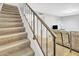 View of carpeted staircase with metal railing at 1732 E Baker Dr, Tempe, AZ 85282