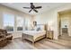 Relaxing bedroom with hardwood floors and a view at 17817 E Cindercone Rd, Rio Verde, AZ 85263