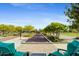 Well-maintained bocce ball court with ample seating at 17817 E Cindercone Rd, Rio Verde, AZ 85263