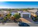 Luxury home exterior with desert landscaping and mountain backdrop at 17817 E Cindercone Rd, Rio Verde, AZ 85263