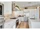 Modern kitchen with stainless steel appliances and white cabinetry at 17817 E Cindercone Rd, Rio Verde, AZ 85263