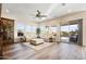 Spacious living room with hardwood floors and sliding glass doors at 17817 E Cindercone Rd, Rio Verde, AZ 85263