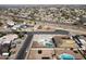 Aerial view of a house with a pool in a residential area at 1801 E Paradise Ln, Phoenix, AZ 85022