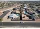 Aerial view showing multiple houses with pools and surrounding desert landscape at 1801 E Paradise Ln, Phoenix, AZ 85022