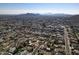 Aerial view of a residential area, featuring houses and a mountain backdrop at 1801 E Paradise Ln, Phoenix, AZ 85022